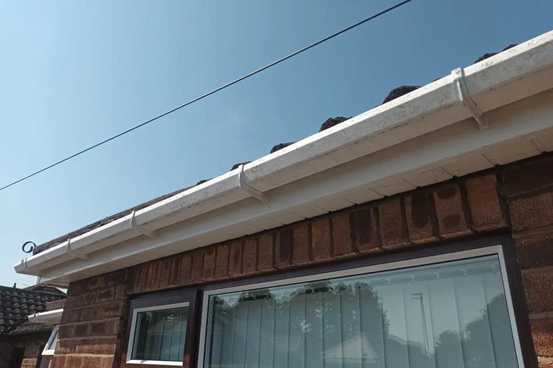 Weathered fascia and UPVC before exterior cleaning