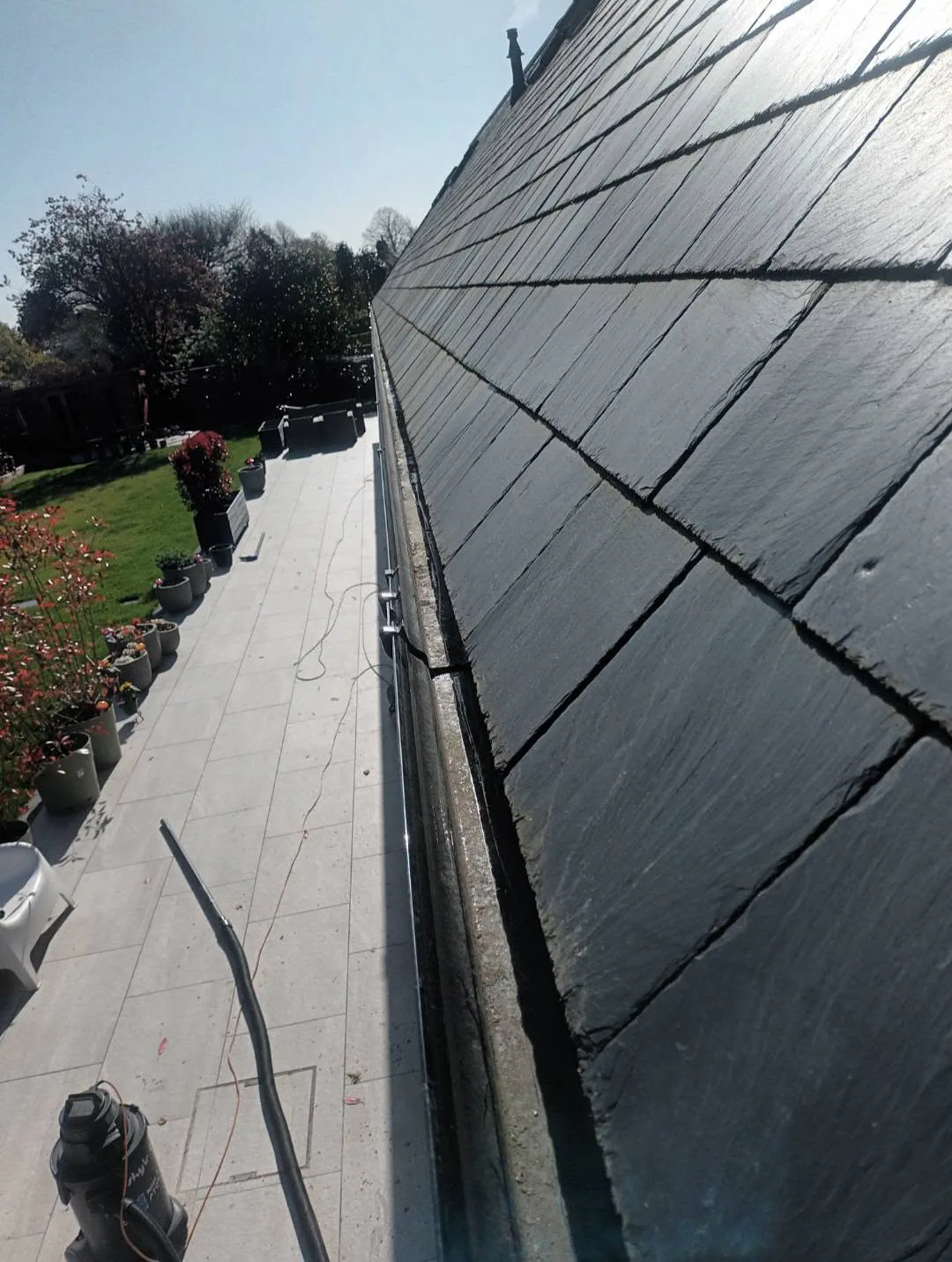 Clear gutter channel after debris removal