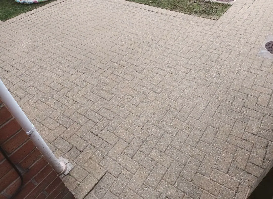 Pale clean paving after pressure washing
