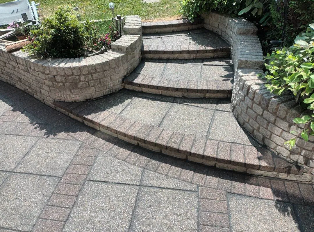 Clean curved patio steps and paving after exterior cleaning